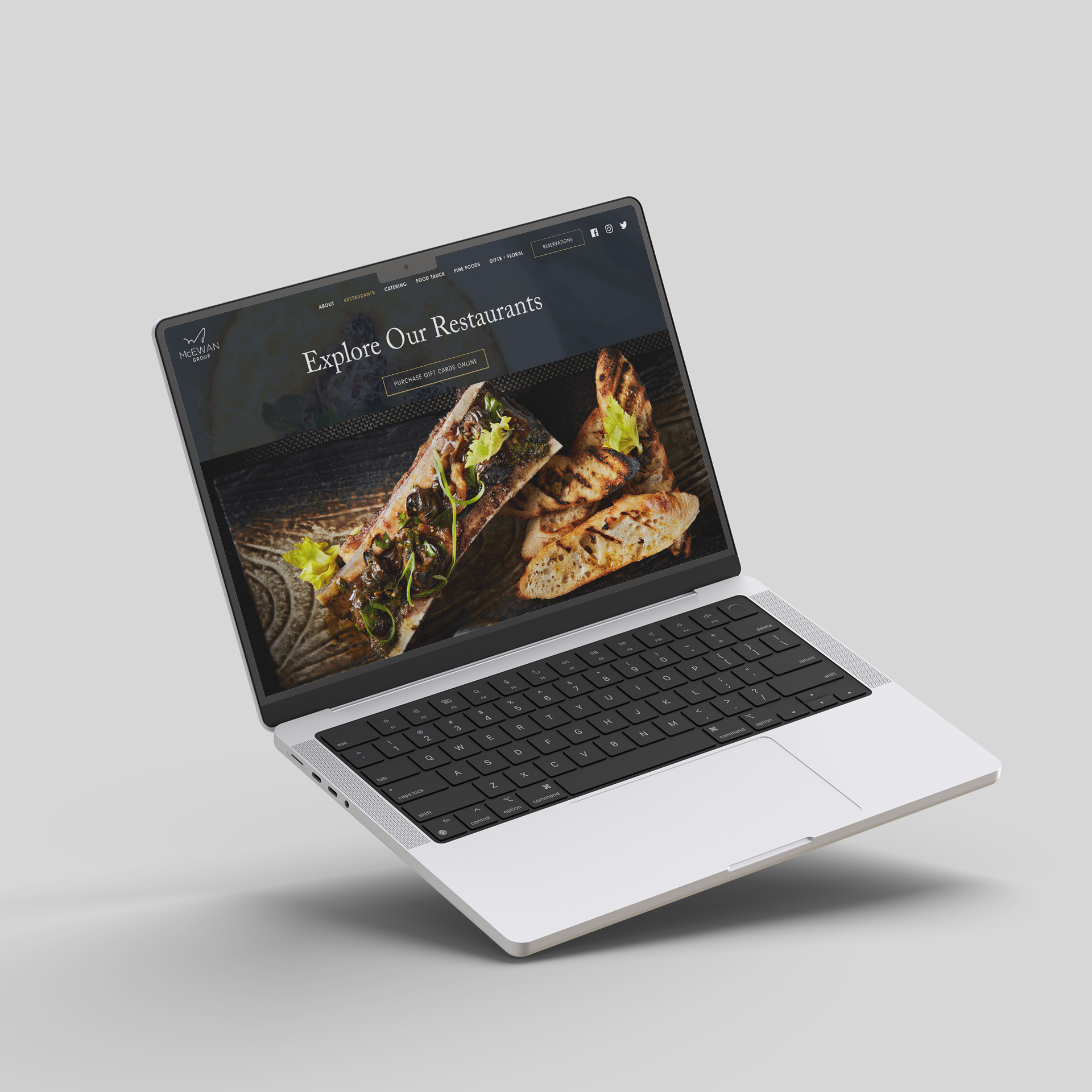 McEwan Group website on laptop